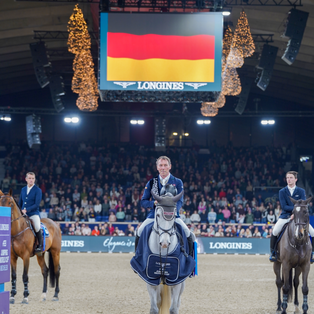 Hans-Dieter Dreher klopt Gilles Thomas en Pieter Devos  in Longines FEI Jumping World Cup, presented by BWP